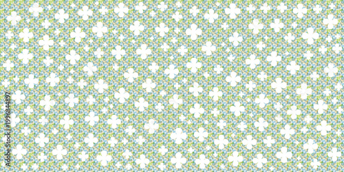Vibrant green and white four-leaf clover pattern vector. Scattered clovers on a natural grass green texture for good luck, Saint Patrick’s Day, and spring designs.