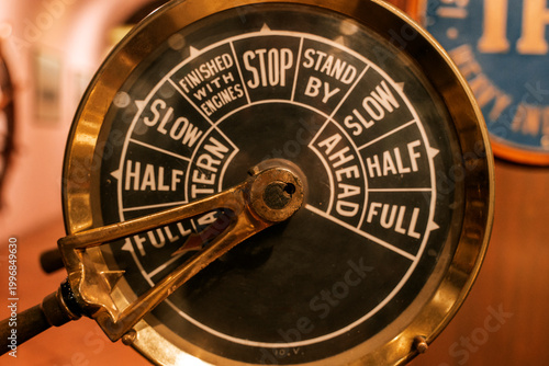 Φωτογραφία Vintage ship engine telegraph dial close-up, nautical control instrument