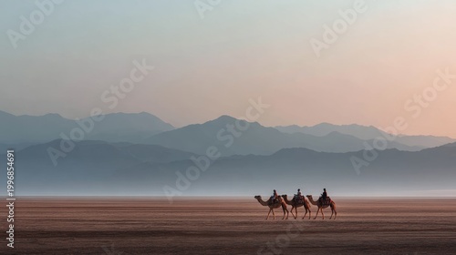Three Camels with Riders in Desert Landscape