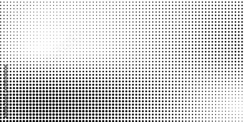 A grayscale halftone pattern transitions from black to white dots.