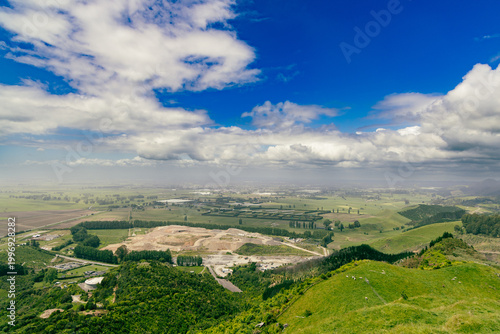 Expansive Rural Valley Landscape Under Dramatic Clouds