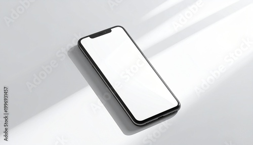 Modern smartphone with blank screen casting a shadow on a white surface, perfect for product mockups and app presentations