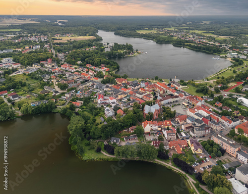Red-roof aerial panorama of Wałcz with lakes, forest and surrounding fields in Zachodniopomorskie, Poland.