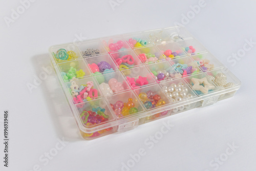Various colourful kind of beads in box case, craft creativity concept