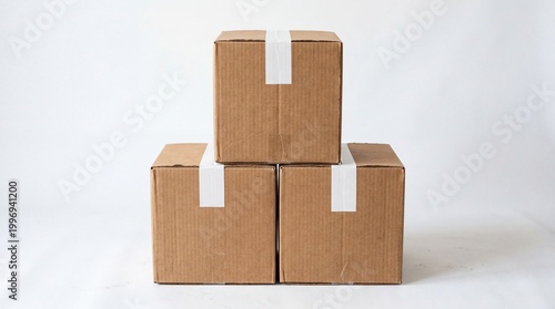 Stack of three brown cardboard boxes for shipping