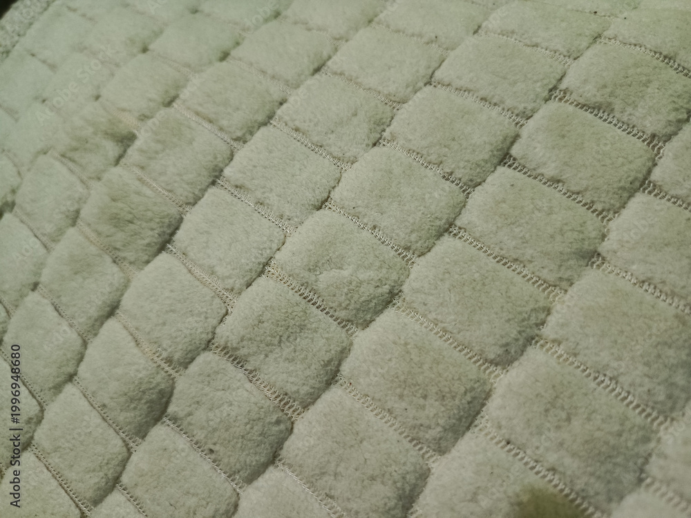 Fototapeta premium Close-up of quilted fabric texture.