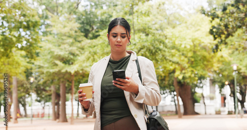 Tableau sur toile Businesswoman, commute and coffee in park with phone, public relations job or check for email update
