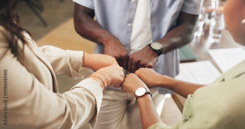 Obraz premium Hands, business and people with fist bump in office for good news, real estate success and celebration. Huddle, gesture and staff achievement for property deal, team motivation and auction milestone