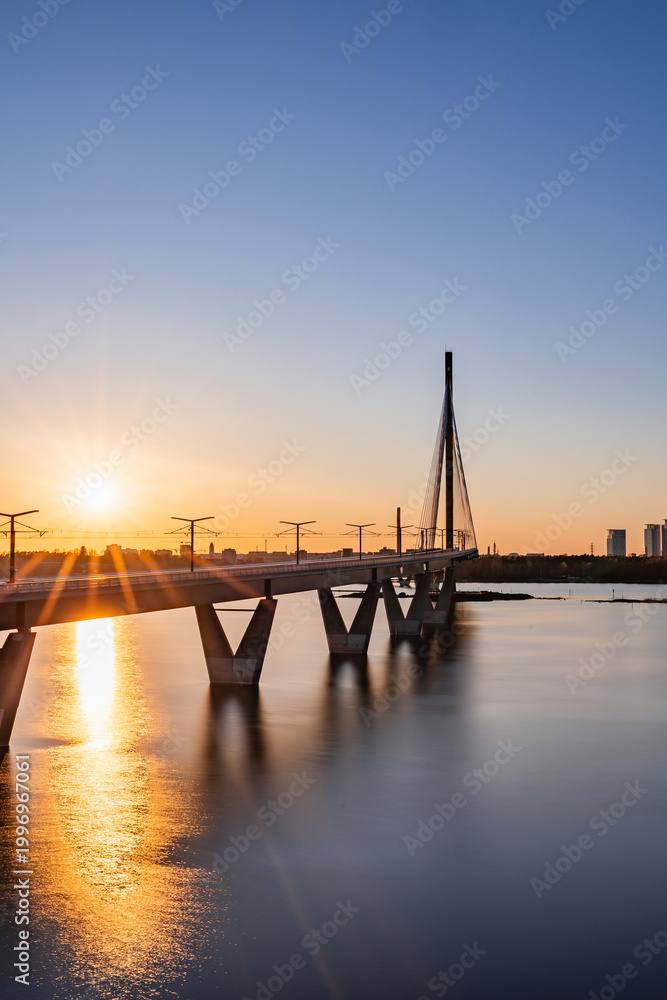 Fototapeta premium Kruunuvuorensilta bridge at sunset, the longest bridge in Finland, Helsinki