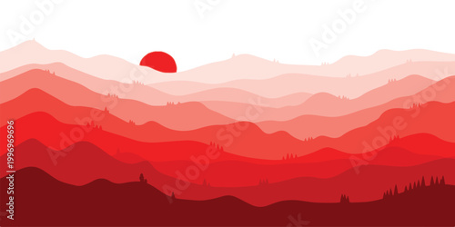 A misty blue mountain range at sunrise with a silhouette of peaks and a forest valley under a foggy morning sky