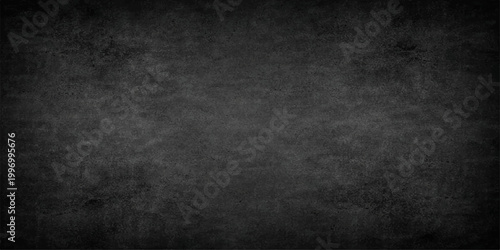 A textured, dark grey background that could serve as a backdrop for a variety of designs, evoking a sense of sophistication and depth.