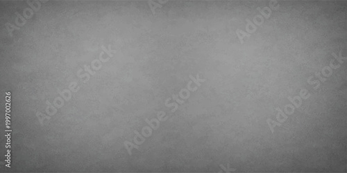 Abstract grey background with subtle texture, evoking a sense of simplicity and depth, a neutral canvas ideal for conveying ideas and designs.