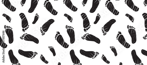 Seamless panoramic vector pattern with dynamic barefoot footprints in varying sizes, creating a sense of movement and depth. Perfect for modern design, branding, textiles and creative backgrounds