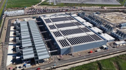 Aerial view of modern data center with solar panels on the roof