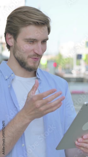 Video Call on Tablet by Man Outdoor, Vertical Video
