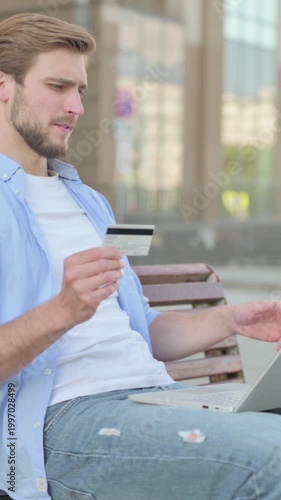 Man Having Online Payment Problem with Laptop, Outdoor, Vertical Video