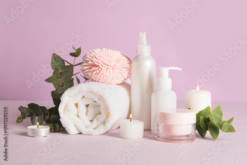 Spa candles with towel, bot...