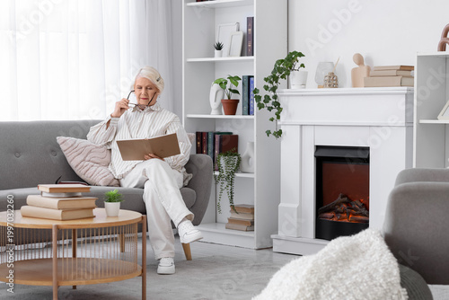Senior woman with eyeglasse...
