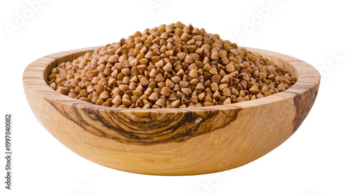 Tableau sur toile Wooden bowl filled with raw buckwheat groats