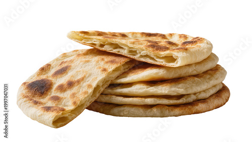 фотографія Stacked golden flatbreads with browned spots and flaky texture