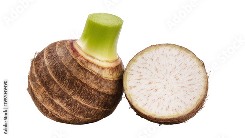 Fotografie Whole and Cut Taro Root with Green Stem on Surface