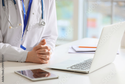 Female doctor working with ...