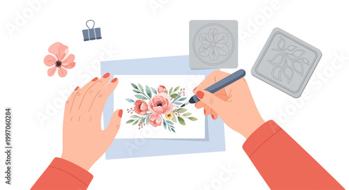 Artist hands drawing floral bouquet on paper with watercolor paints and brushes