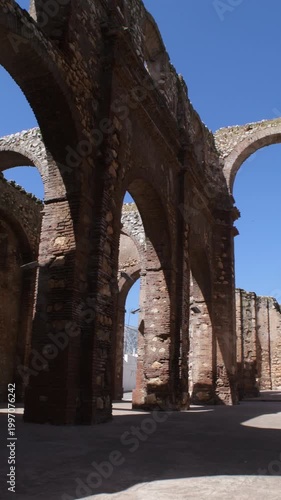 Remains of an old church in Zafarraya, Spain. 4K Vertical