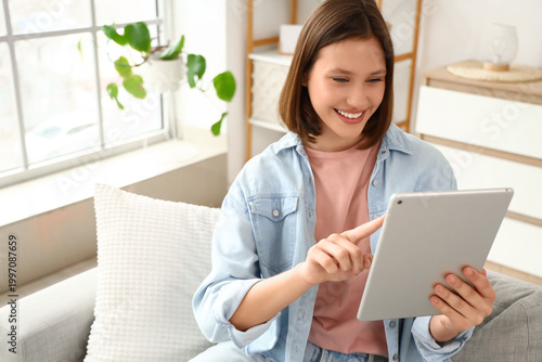 Young woman using tablet co...
