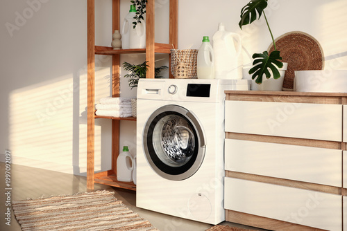Stylish laundry room with m...