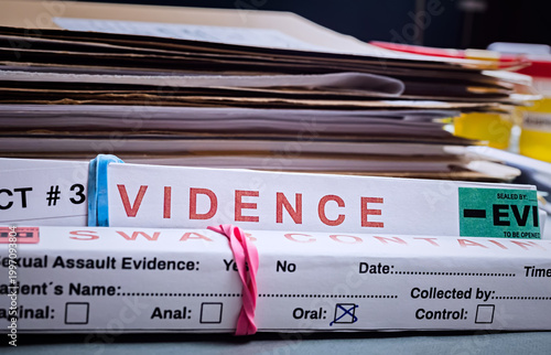 Several boxes of swab evidence in the crime lab for analysis, conceptual image.