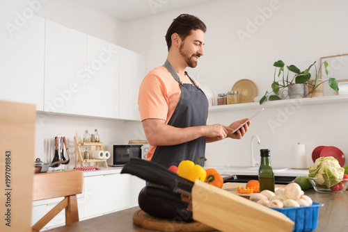 Handsome bearded man with t...