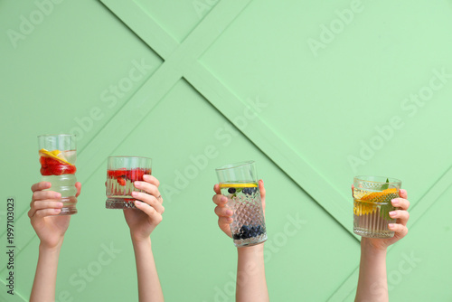 Many hands with infused wat...