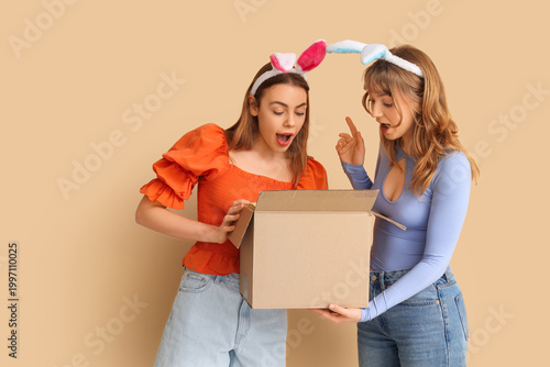 Surprised young women in bu...