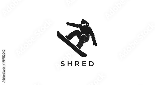 Snowboarder in motion with SHRED logo.