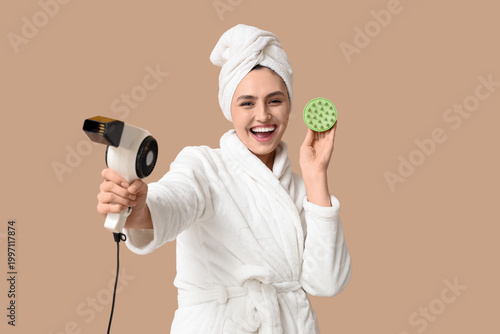 Happy young woman with hair...
