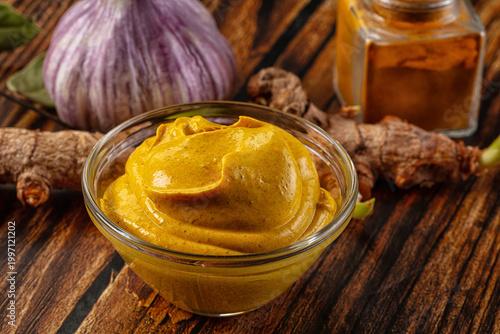 Indian yellow spicy curry sauce