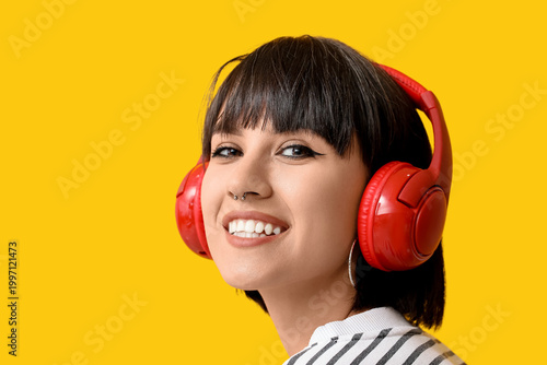 Happy stylish young woman i...