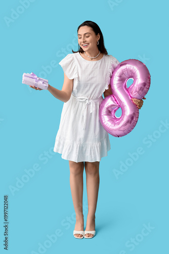 Happy young woman with air ...