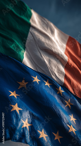 italian flag waving next to european union flag. italy member of the eu