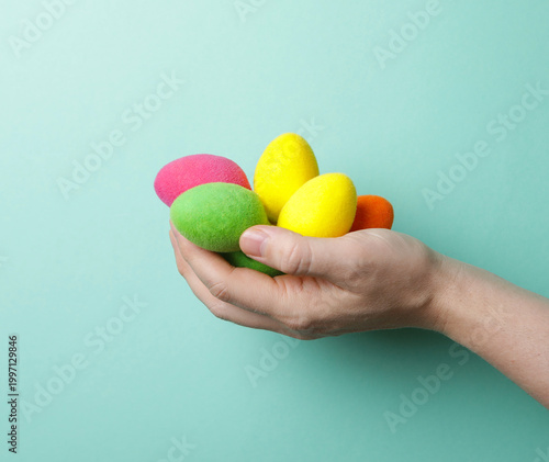 Spring time. hand holding colorful easter eggs. Easter. Spring. Photo. Decoration. 