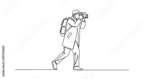 Tableau sur toile Man walking with camera equipment.
