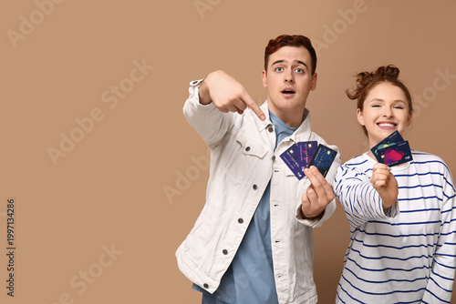 Young couple pointing at cr...