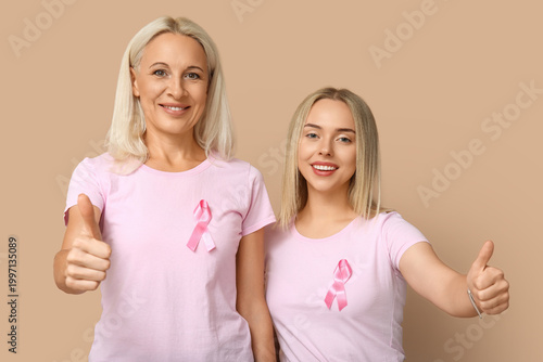 Women with pink ribbons sho...