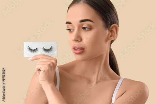 Young woman with false eyel...