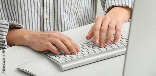 Young female programmer wor...