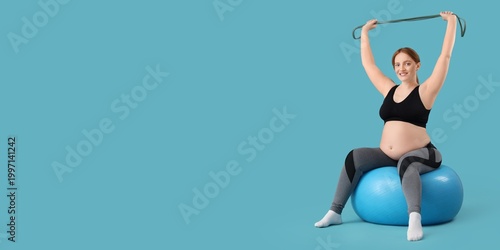 Sporty young pregnant woman...