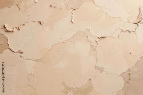 Cracked beige plaster wall with peeling paint and rough texture, showing natural wear and aging. Abstract grunge background with uneven surface and subtle details.