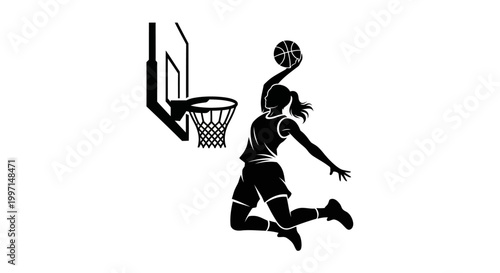 Woman basketball player dunking ball in silhouette