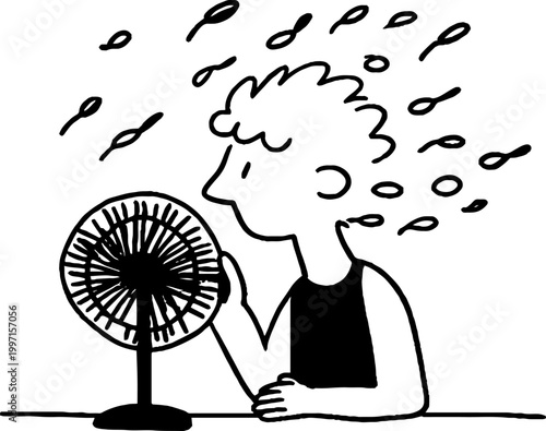 Man cooling off at electric fan while seated at table indoors